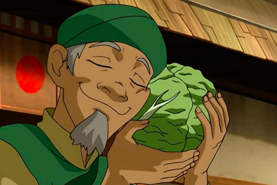 Cartoon image from Avatar: The Last Airbender, showing the cabbage man pressing his cheek lovingly to a cabbage.